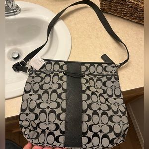 New coach bag. New never used. Black and gray.